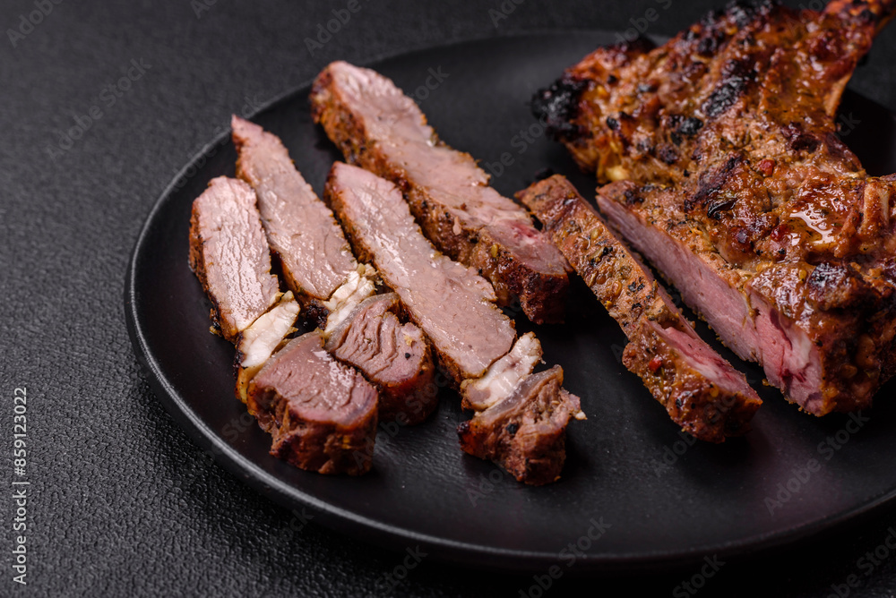 Juicy beef tomahawk steak on the bone baked on the grill Juicy beef tomahawk steak on the bone baked on the grill