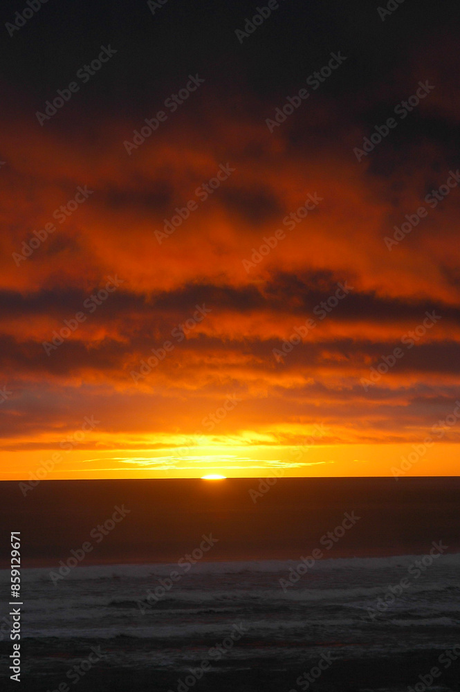 Sun setting in the southern regions in the world across New Zealand Sun setting in the southern regions in the world across New Zealand