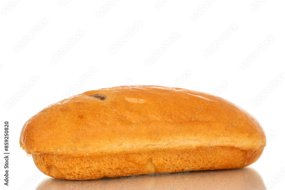 One sweet bun, macro, isolated on white background. One sweet bun, macro, isolated on white background.