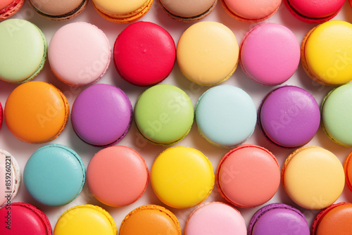 Colorful french macarons background © lillyrosy