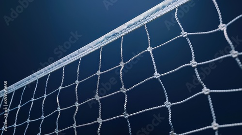 Close-up of a volleyball net, highlighting the net's texture, the plastic coating on the top edge, and the net's attachment to the top bar