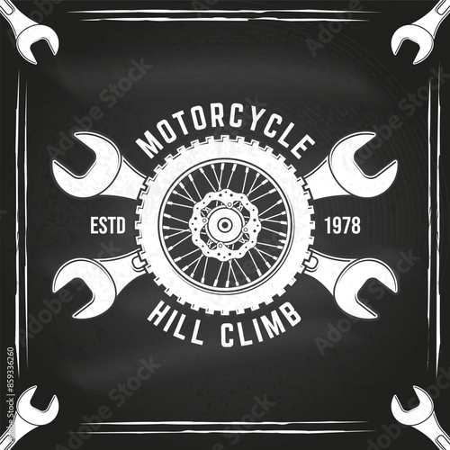 Motorcycle hill climb logo, badge, sticker on the chalkboard. Vector illustration. Extreme sport with motorcycle wheel and wrenches. Monochrome style motorcycle wheel and wrenches
