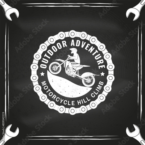 Motorcycle hill climb logo, badge, sticker on the chalkboard. Vector. Extreme sport with motorbike for extreme jump and race in mountains. Monochrome style man riding in helmet on a motorcycle