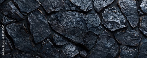 Top-down view of a black stone backdrop. © Studicon