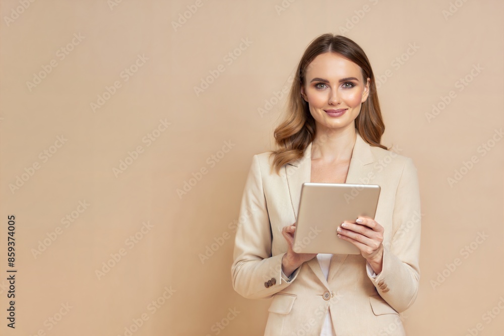 Young Professional Woman Holding Tablet: A studio shot of a young professional woman holding a tablet, with a clean background and space for text.
Young Professional Woman Holding Tablet: A studio shot of a young professional woman holding a tablet, with a clean background and space for text.