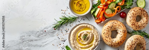Wallpaper Mural An overhead view of three whole grain bagels served with hummus and assorted vegetables arranged on a white marble countertop Torontodigital.ca