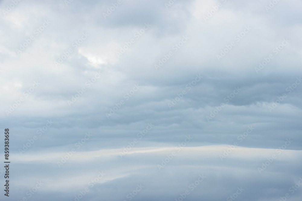 In mid-June, storm clouds build over Pike Lake near Hartford, Wisconsin In mid-June, storm clouds build over Pike Lake near Hartford, Wisconsin