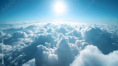 Dramatic Cloudscape Against Vibrant Blue Sky with Fluffy White Clouds