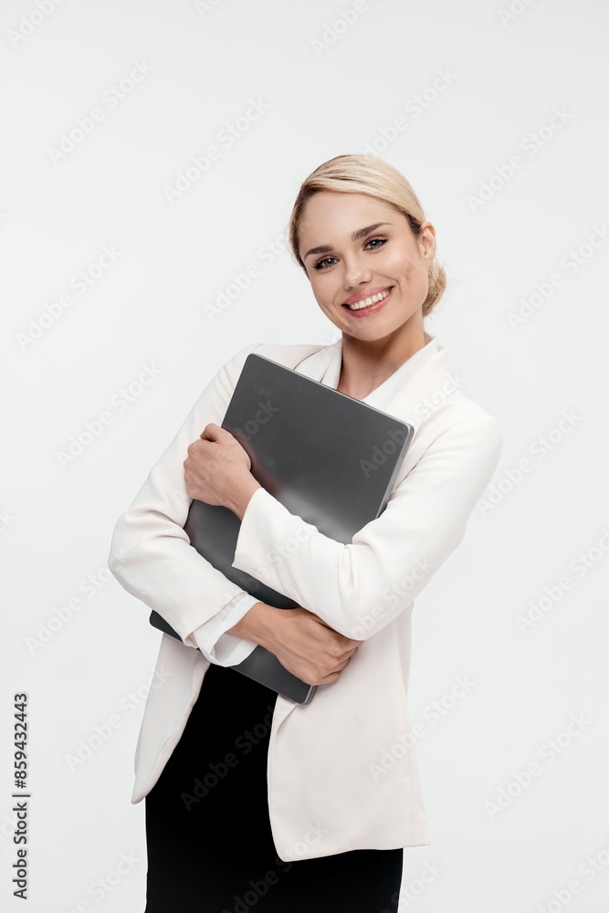 Portrait of a happy, smiling caucasian businesswoman working with laptop computer isolated over white background. Business, technology, online education, student concept. Portrait of a happy, smiling caucasian businesswoman working with laptop computer isolated over white background. Business, technology, online education, student concept.