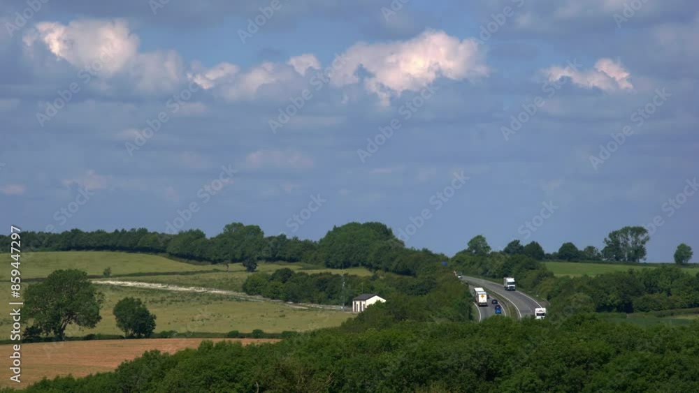 Distant motorway traffic landscape in england uk. Distant motorway traffic landscape in england uk.