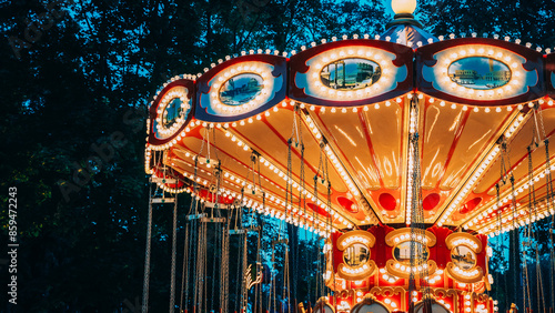 Carousel Merry-Go-Round. Summer Evening In City Amusement Park.