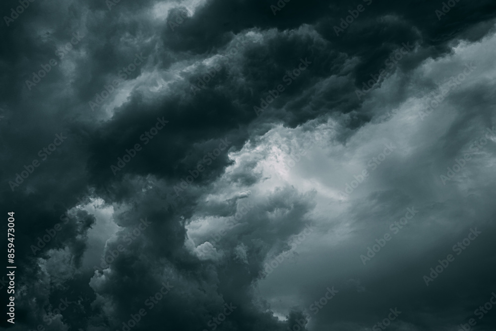 Cloudy Sky With Dark Storm Clouds During Rain. Natural Background With Rainclouds. natural weather background dark blue backdrop thunderstorm stormy sky Cloudy Sky With Dark Storm Clouds During Rain. Natural Background With Rainclouds. natural weather background dark blue backdrop thunderstorm stormy sky