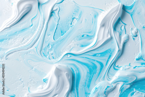 Close up of Toothpaste Texture: Top View of White and Blue Toothpaste  on Solid Surface Background. Stomatology and Dental Care Textured Product Backdrop