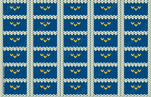 Seamless knitted pattern.Knit repeat pattern in blue.Vector graphic illustration.