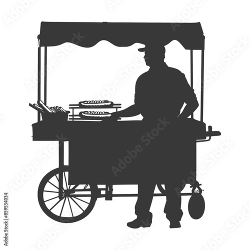 Silhouette of Street Vendor Cooking Hotdogs on Cart