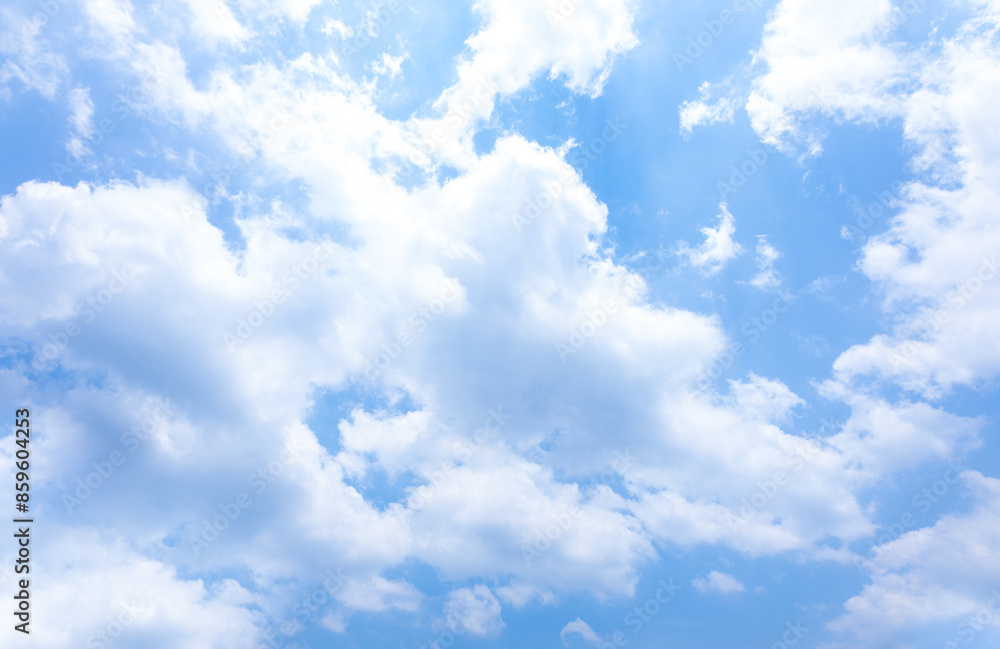 Beautiful blue sky and white fluffy group of clouds background in the morning skyline Beautiful blue sky and white fluffy group of clouds background in the morning skyline