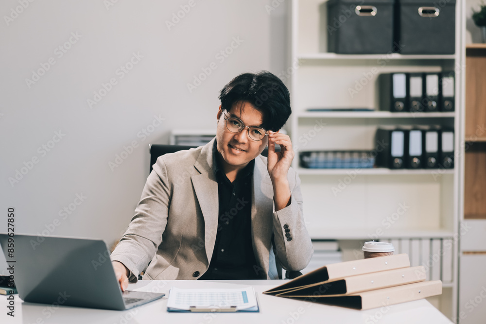 Video call online meeting asian businessman looking web camera and having fun talking and gesturing, man working inside office sharing plans with partners and colleagues, boss in shirt and glasses. Video call online meeting asian businessman looking web camera and having fun talking and gesturing, man working inside office sharing plans with partners and colleagues, boss in shirt and glasses.