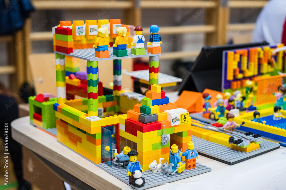 Naklejka premium Tallinn, Estonia - May 5, 2024: Moving Lego robot built by kids. At First Lego League children build robots and solve robotics challenges.