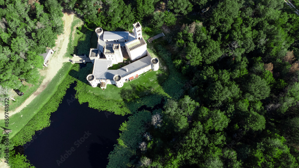 Drone view of Newman's Castle, a unique custom creation hidden just outside Bellville in the rolling countryside, TEXAS, USA. Drone view of Newman's Castle, a unique custom creation hidden just outside Bellville in the rolling countryside, TEXAS, USA.