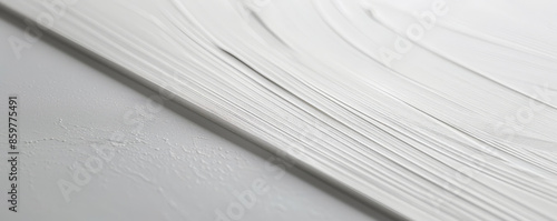 White Metallic Surface: A sleek white metallic surface with a subtle sheen, offering a modern and industrial look. photo