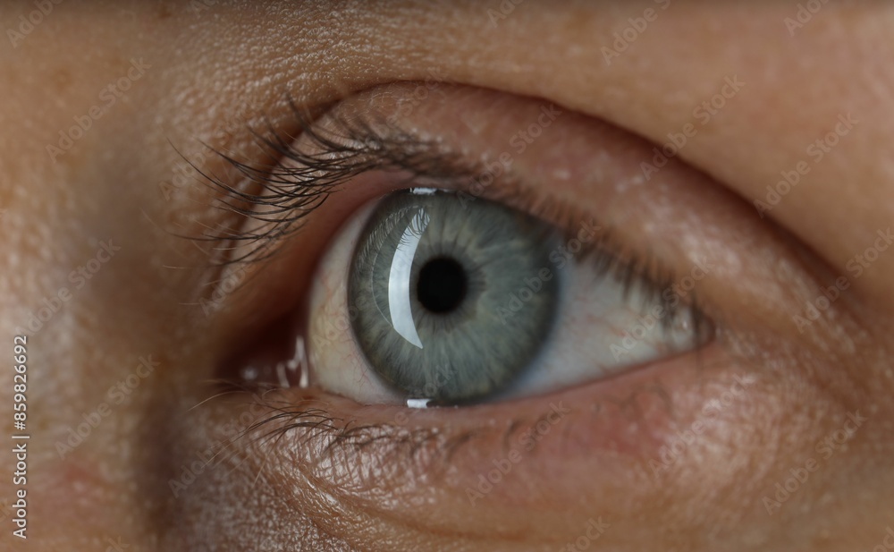 Woman with beautiful blue eyes, macro photo Woman with beautiful blue eyes, macro photo