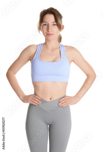 Woman with slim body posing on white background © New Africa