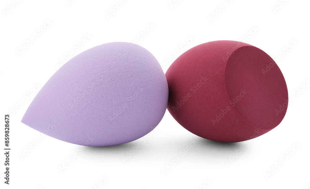 Two colorful makeup sponges isolated on white Two colorful makeup sponges isolated on white