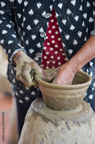 working hands on clay pot of Champa people in Vietnam