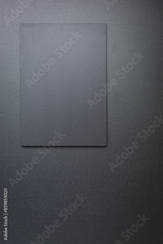 blank black notebook on shine black background