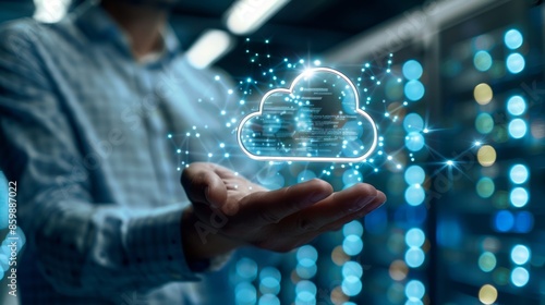 Cloud computing specialist holding a cloud icon with cloud server screens blurred in the background cloud technology IT infrastructure