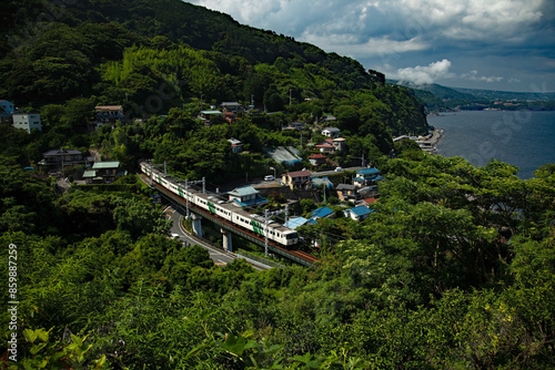 фотографія Express train running along the coast in Japan.