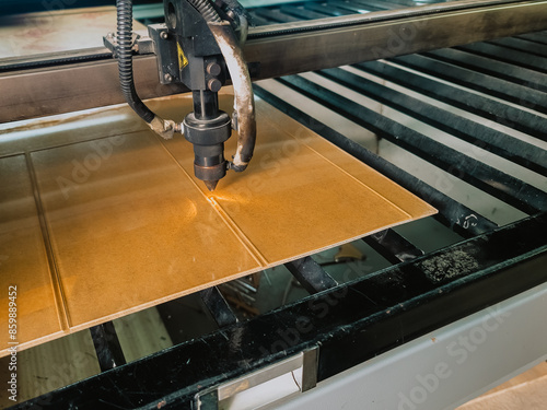 Acrylic sheet carving machine. Flatbed cnc machine working.