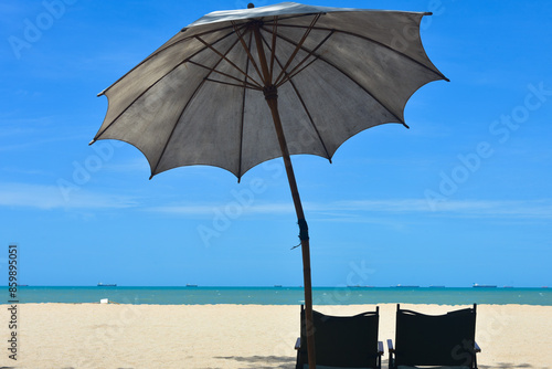 Beach waves of the sea on the sandy beach season Summer on top view background .