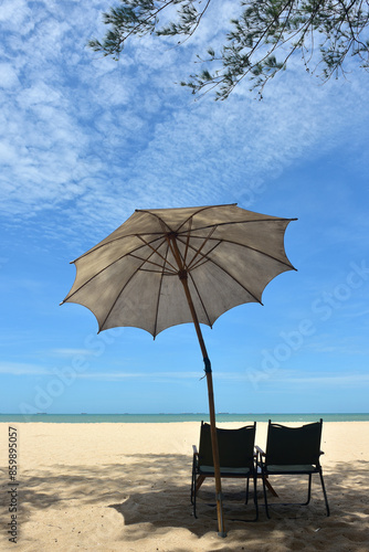 Beach waves of the sea on the sandy beach season Summer on top view background .