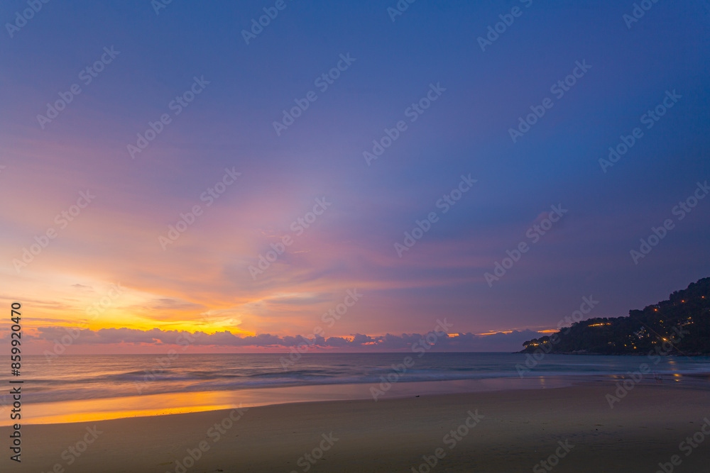 Obraz premium amazing sky at sunset..Scene of Colorful romantic sky sunset with cloud in sweet sky background..colorful clouds moving away rolling. .colorful clouds adorn the sky over the sea.