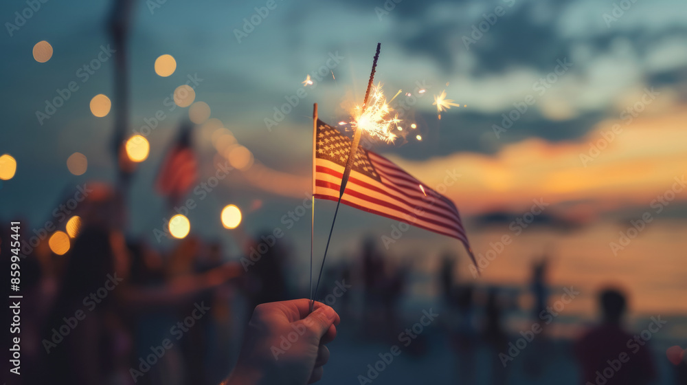 Close up of a person holding an American flag and sparkler celebrating 4th July independence day Close up of a person holding an American flag and sparkler celebrating 4th July independence day