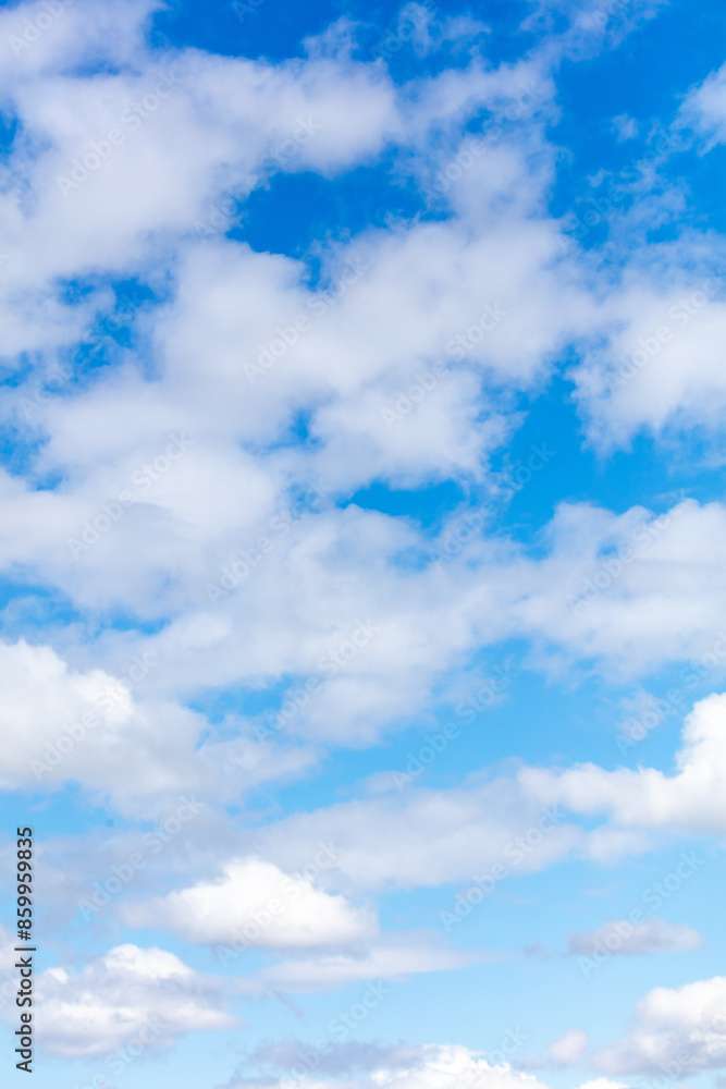 Obraz premium White clouds against a blue sky