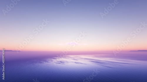 A breathtaking view of the ocean at sunset, with the sky ablaze in a vibrant pink hue