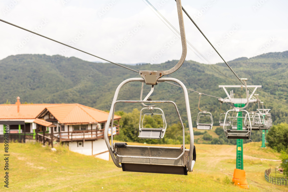 Mountain lift on sky background. Empty space for text Mountain lift on sky background. Empty space for text