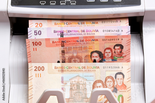 Bolivian boliviano in the counting machine photo