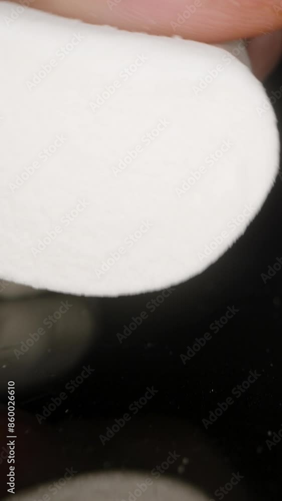 Vertical video. Soft Tender Marshmallows Squeezed by Male Hand, Unhealthy Sweet Food. Dolly Slider, Close-Up. Vertical video. Soft Tender Marshmallows Squeezed by Male Hand, Unhealthy Sweet Food. Dolly Slider, Close-Up.