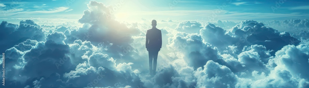 Silhouette of a person standing amid clouds with the sun shining brightly, representing freedom, inspiration, and limitless possibilities. Silhouette of a person standing amid clouds with the sun shining brightly, representing freedom, inspiration, and limitless possibilities.