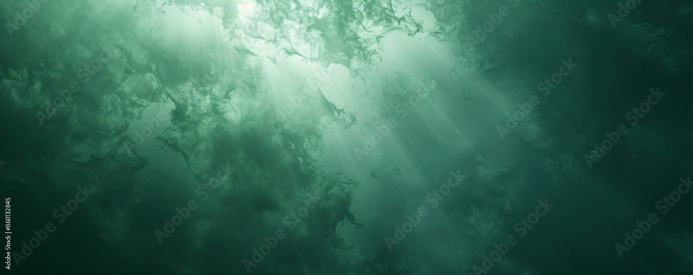 Obraz premium Sunbeams Through Deep Green Water