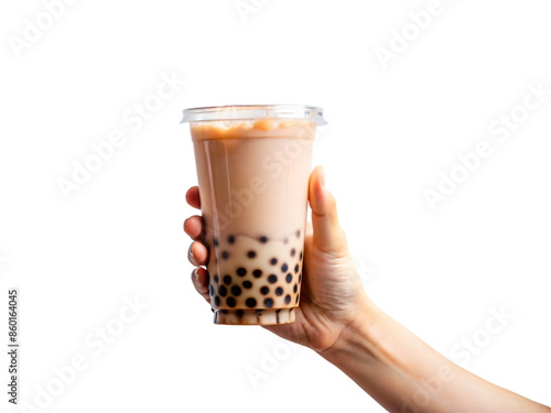 A close-up photo of a hand holding a iced bubble tea photo