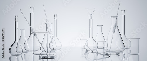 Group of scientific laboratory glassware with clear liquid solution, Research and development concept.Realistic Glass Laboratory Equipment Set. Flasks and measuring beaker for science experiment