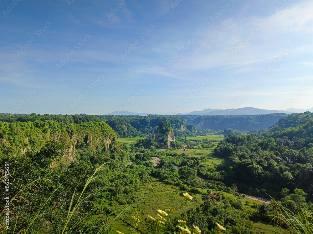 expanse of green hills and blue skies during the day, beautiful views from the top of the name Puncak Taruko Bukittinggi, Indonesia expanse of green hills and blue skies during the day, beautiful views from the top of the name Puncak Taruko Bukittinggi, Indonesia