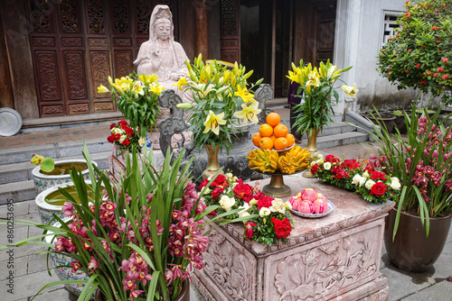 Hanoi, Vietnam - 29 Jan, 2024: Buddhist shrine at the One Pillar Pagona, Hanoi, Vietnam photo