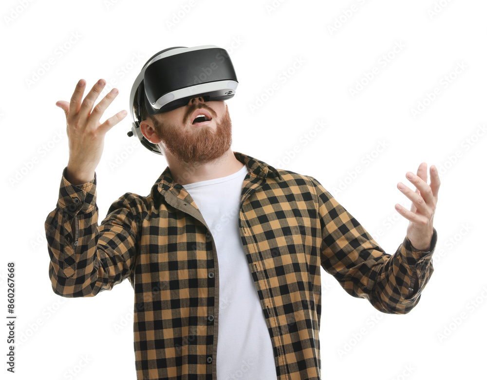 Surprised man using virtual reality headset on white background Surprised man using virtual reality headset on white background