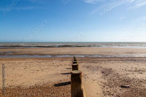 A view over the beach towards the ocean, at Pett Level on the Sussex coast photo