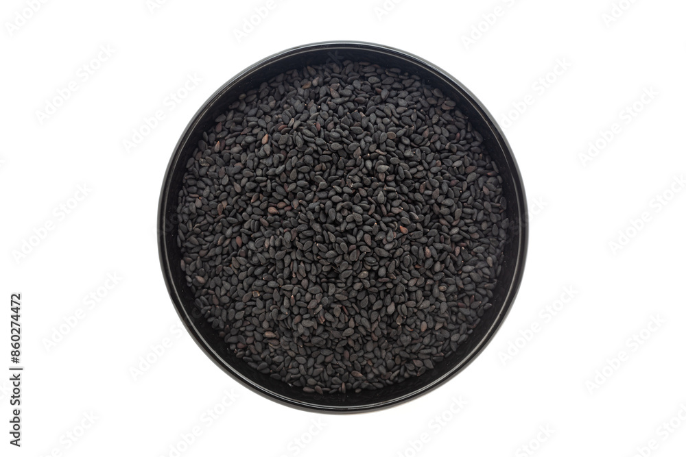 Organic Black Sesame (Sesamum indicum) Seeds, in a black ceramic bowl. Isolated on a white background. Top View Organic Black Sesame (Sesamum indicum) Seeds, in a black ceramic bowl. Isolated on a white background. Top View